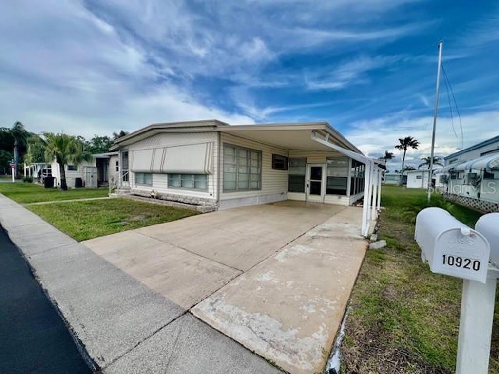 Photo of 10920 Independence Drive, Port Richey, FL 34668 (MLS # W7884810)