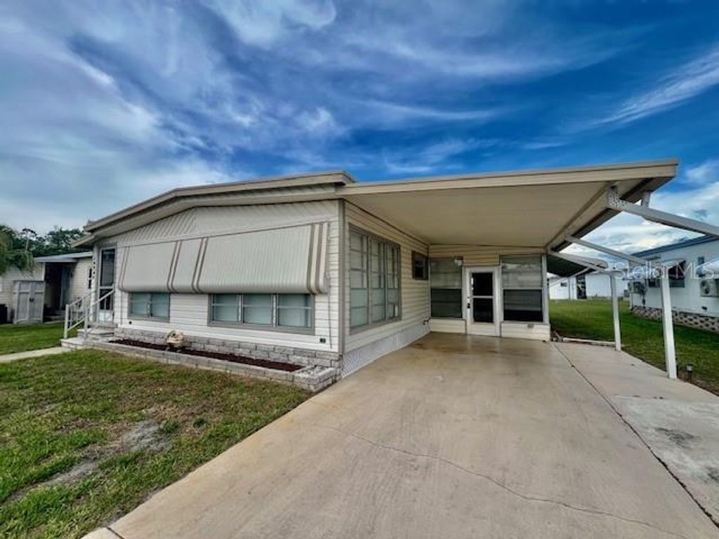 Photo of 10920 Independence Drive, Port Richey, FL 34668 (MLS # W7884810)