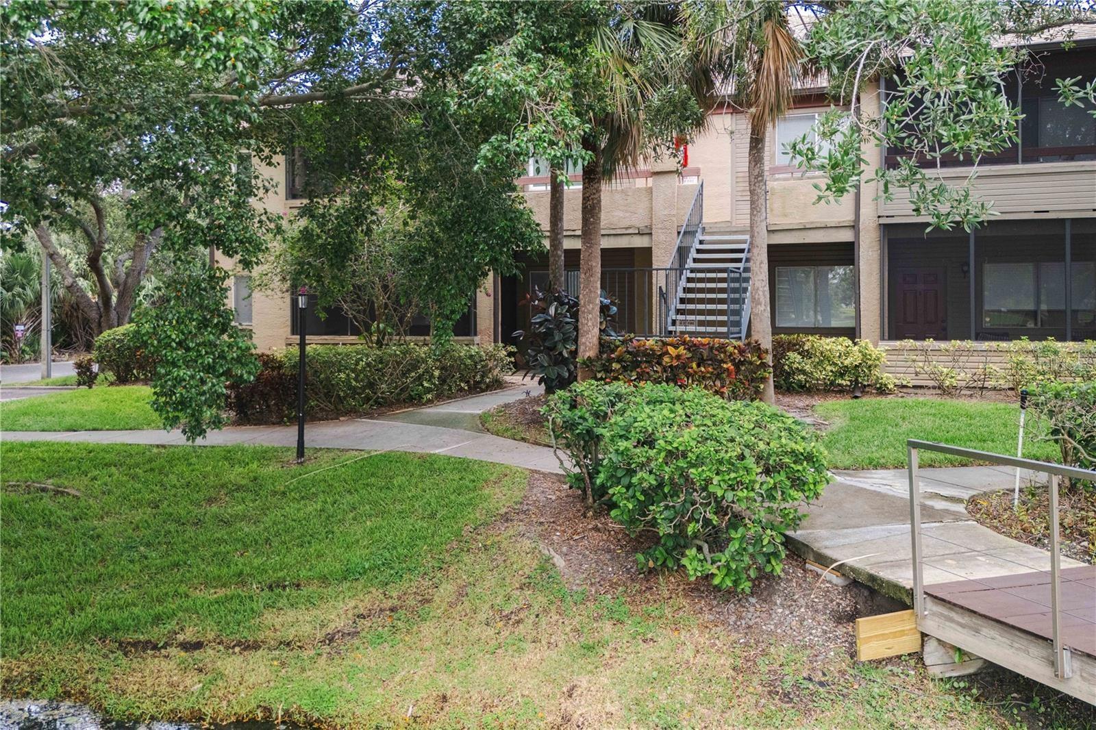 Welcome to resort-style living at Itopia in St. Petersburg! This spacious two-bedroom, two-bath ground-floor condominium offers 1,028 square feet of well-maintained living space with laminate flooring throughout and stainless steel appliances. Go out to your private screened patio and take in tranquil pond views, just near the community pool and clubhouse. Itopia Condominiums features two heated pools, hot tubs, a fitness center, indoor sauna, tennis and basketball courts, sand volleyball, business center, clubhouse and dog park, all in a gated community. Ideal for investors, snowbirds or professionals seeking low maintenance living just 20 minutes to downtown Tampa, near Interstate 275, 4th Street corridor and St. Pete Beach. Note: this property is also listed for sale, however, tenants will be protected if property is sold during lease term.