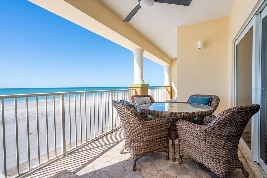 This is upscale beach living at its finest! PRIDE of ownership. A stunning Southwest Corner location on the 1st floor fully furnished/turnkey (few exclusions including personal items) with 42 feet of waterfront balcony where you will enjoy panoramic unobstructed water views and legendary sunsets. This 3-bedroom condo at The Beach Club of Madeira is in a quaint collection of 12 upscale residences. You will love the abundance of natural light in this spacious open floor plan with soaring ceilings. The views will be enjoyed from the Great Room with 6 slider doors and the main Bedroom with triple slider doors. This unit has been upgraded from the original design with elegant designer touches, including luxurious granite from countertops to unique kitchen backsplash, high-end GE appliances. In addition to amazing balcony views, the master suite boasts double walk-in closets with custom built-ins, a garden tub and large separate shower, double sinks. The 2nd and 3rd bedrooms are also en-suite including bathrooms with walk-in closets. The 14x11 media room with custom French doors could be used for a 4th bedroom, office, game room or TV room. In addition to a private covered parking space under the building, this unit also includes a deeded, over-sized 1-car garage with a lovely finished Private Beach Cabana (with bar for entertaining & running water) opening directly to the powder-sand beach, with over 270' of frontage on the Gulf of Mexico. Ample guest parking under the building. This boutique community has a controlled access lobby, community heated pool/spa.  Property is just a short walk or trolley ride to restaurants, shopping and all the fun and festivities of John's Pass. Very close to the Tampa International and St. Petersburg airports.