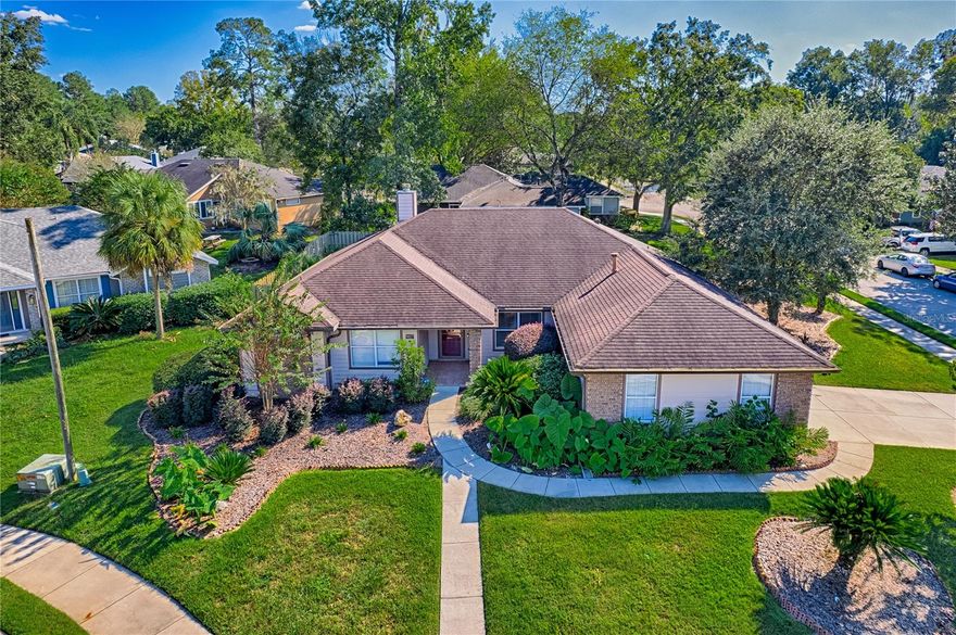 This 3-bedroom, 2-bathroom pool home with an office is located in the sought after Eagle Point Neighborhood! This corner-lot home with 1958 sq feet of space has an open layout. Enter the home to the living room with gas fireplace, views of your back yard and in-ground, screened pool. To the right is an eat in kitchen with breakfast bar and quartz countertops, contemporary cabinetry, tile flooring, pendant lighting and stylish backsplash. The dining area is to your right. The owner's suite has direct pool access, a large walk-in closet with a spa-like bathroom with double vanity, soaking tub and separate walk-in shower. The office continues from the suite and has a direct entrance off the foyer. On the other side of the home are 2 additional bedrooms that share a hall bathroom complete with a step in Kohler Jacuzzi tub. Walk through the laundry area to the two-car garage. The backyard is fully fenced, landscaped.  A side garden is ready for planting. The roof is 8 years old.  Recent upgrades include new HVAC with a transferable 10-year warranty, new water tank, new clothes dryer, updated lighting fixtures, an enlarged owner's suite bathroom with a barn door dividing bath and bedroom, Sherwin Williams interior paint, freshly painted fence with new fiberglass gates, pool converted to salt, lanai re-screened by Screen Doctors. Centrally located near Ft. Clarke Middle School and Hidden Oak Elementary. Eagle Point offers convenience and community— just minutes from shopping, parks, and restaurants. Easy access to I-75.
