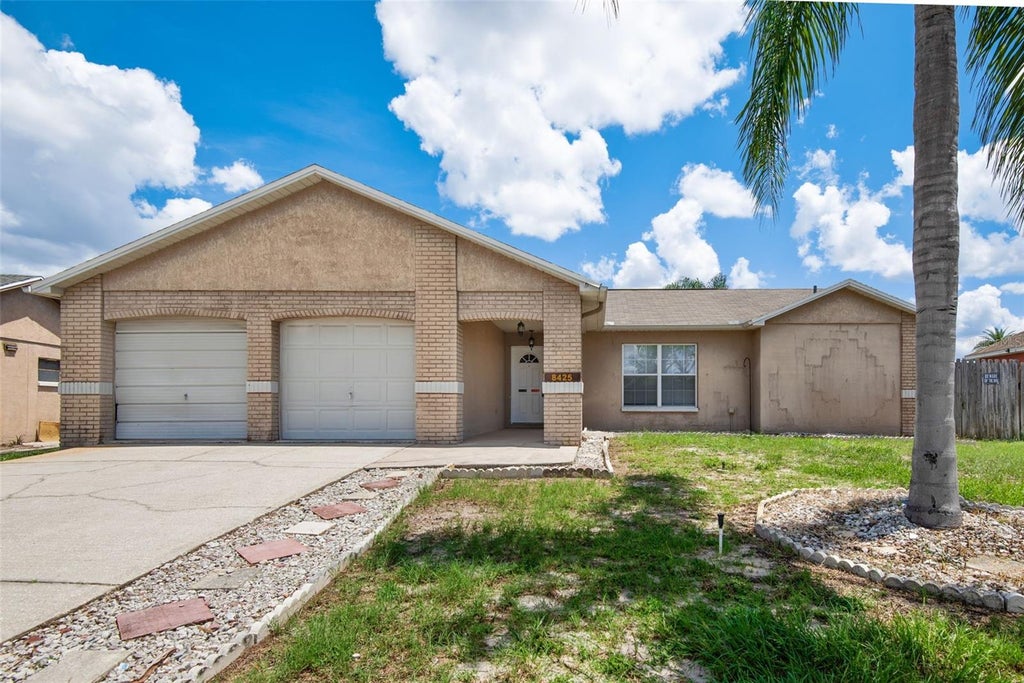 Photo of 8425 Corney Drive, Port Richey, FL 34668 (MLS # TB8544848)