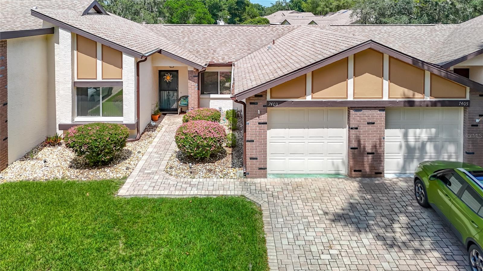 Welcome to this beautifully updated 2-bedroom, 2-bathroom villa nestled in the highly sought-after community of The Heather. From the moment you arrive, you'll appreciate the home's inviting curb appeal and peaceful setting. Inside, you'll find a well-maintained residence offering peace of mind with a professionally repaired sinkhole (2014) and a spacious, low-maintenance lifestyle ideal for full-time living or a seasonal getaway. Step inside to discover a thoughtfully designed layout featuring an enclosed sunroom, high ceilings, and oversized rooms that create a light-filled, open atmosphere—perfect for relaxing, hosting guests, or simply enjoying the Florida sunshine year-round. Ideally located just a short stroll from the community clubhouse, residents have access to premium amenities including a large heated saltwater pool and a hot tub/spa area, offering the ultimate in leisure and relaxation. Just minutes from Weeki Wachee Springs State Park, shopping, dining, and outdoor recreation, this villa truly combines comfort, convenience, and the best of Florida living.