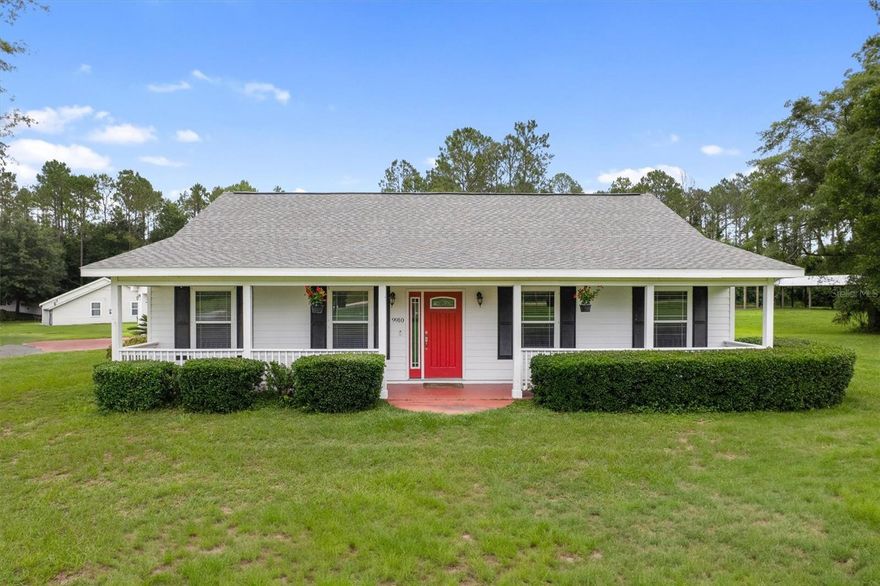 One or more photo(s) has been virtually staged. Welcome to this beautifully maintained 3-bedroom, 2-bath ranch style home nestled on 2 peaceful acres just minutes from Trenton. Built in 2007 and loaded with upgrades, this move-in-ready home features 1,717 sq ft of comfortable living space, a paved driveway, and two large pole barns for all your storage or hobby needs. Step inside to a spacious, open-concept living area with vaulted ceilings, rich wood flooring, and a cozy gas fireplace. The kitchen shines with wood cabinetry, solid surface countertops, a porcelain sink, breakfast bar, tile flooring, pantry, and a built-in China cabinet with sliding drawers. A bright dining space connects seamlessly for entertaining and everyday living. The generously sized bedrooms include walk-in closets, and the primary suite boasts a tray ceiling and en-suite bath with a double vanity. Additional highlights include crown molding throughout, ceiling fans, and blinds already in place. A dedicated laundry room comes equipped with a washer and dryer. Practical features include a 2021 roof, 2023 water heater, 2022 refrigerator and water pump, 2021 stove and 2024 microwave. The home is protected by a whole-house propane generator, and features a central vacuum system, Hardie board siding, well, and septic (pumped 2022). Enjoy rural living with modern conveniences, just minutes to Trenton and Chiefland and 30 minutes to Gainesville and close to the Gulf Coast towns of Cedar Key, Suwannee, and Steinhatchee. Buyer to verify all measurements and school zones.