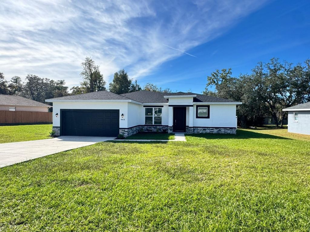 Photo of 442 Marion Oaks Course, Ocala, FL 34473 (MLS # OM712940)