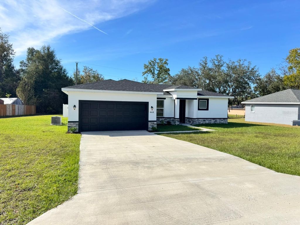 Photo of 442 Marion Oaks Course, Ocala, FL 34473 (MLS # OM712940)