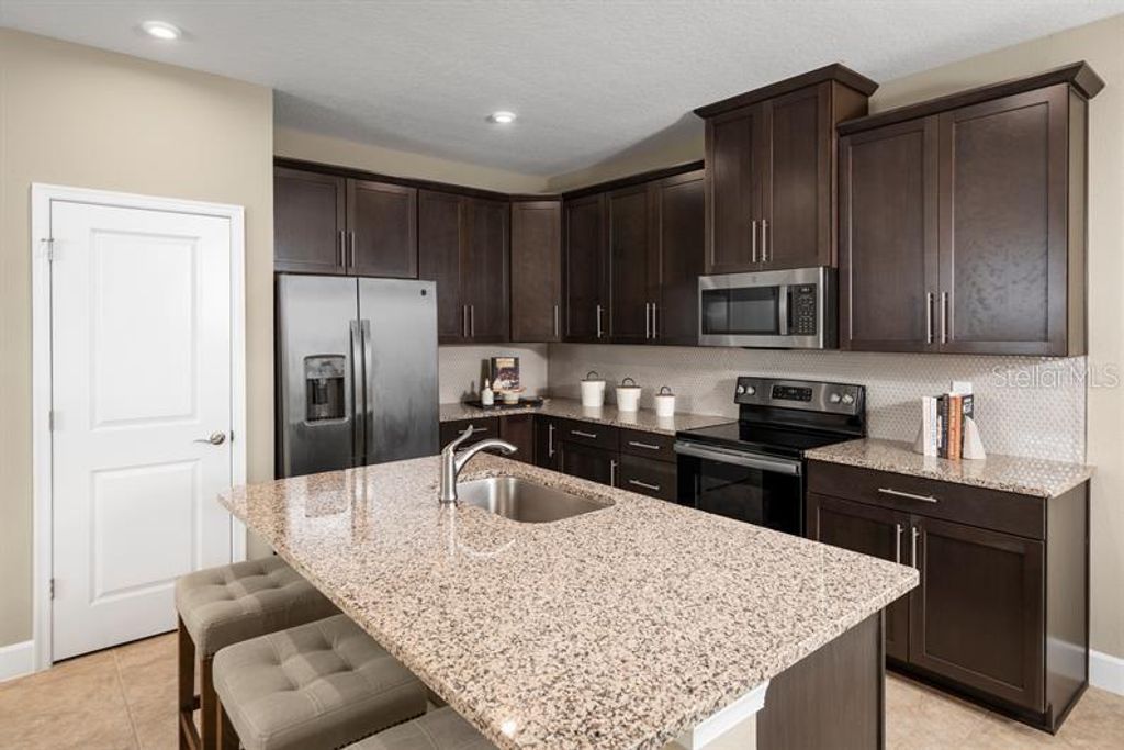 Photo of 1723 W Palms Drive, Port Charlotte, FL 33953 (MLS # W7875930)