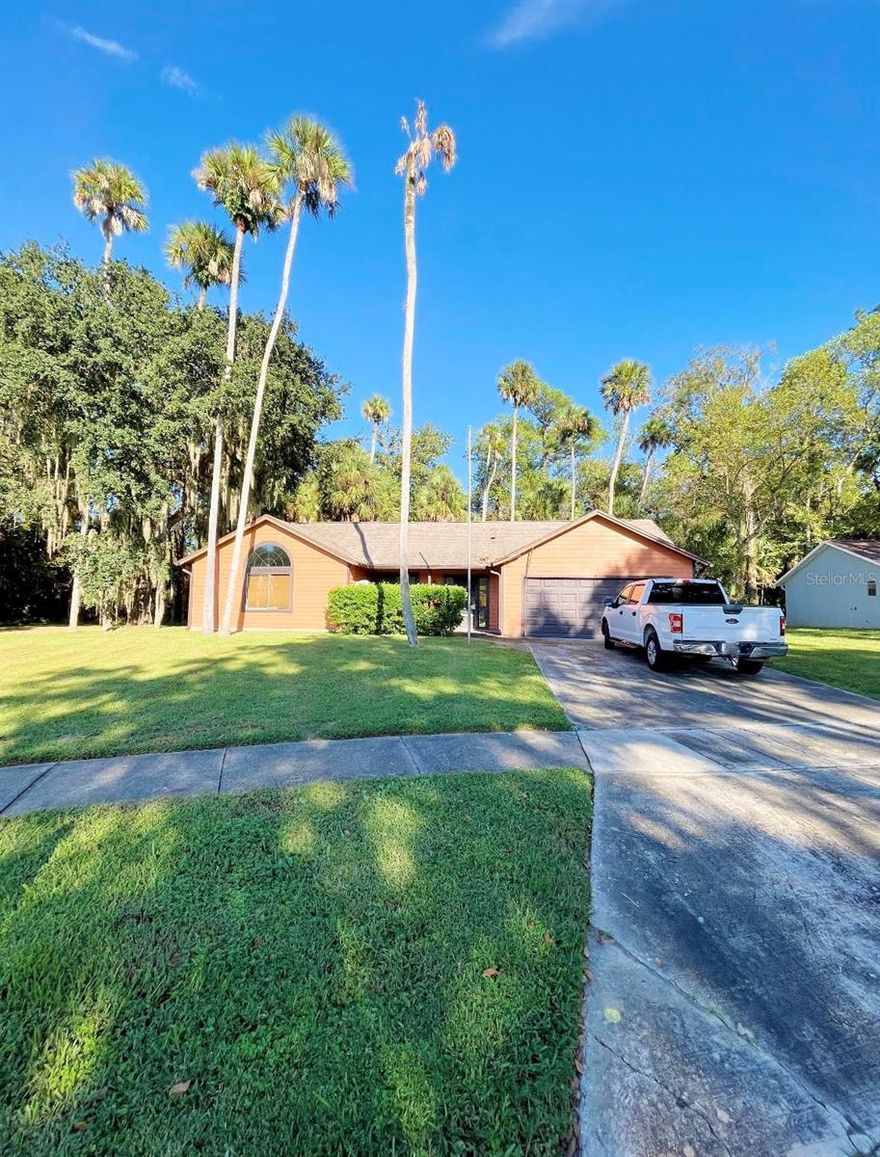 FULLY RENOVATED & MOVE-IN READY! This is an outstanding property, and you will find skillful updates in this 3 bed, 2 bath, 1,503 sq ft single family home in Winter Springs. Located on ONE FULL ACRE in beautiful North Orlando Ranches, the entire house was expertly renovated a few years ago. The entryway and vaulted ceilings are something to behold as you walk in, and this terrific home has spacious living spaces, an efficient layout, and large windows with tons of natural light. New flooring, cabinets, and granite countertops throughout the home including kitchen and bathrooms. The kitchen was upgraded with a new suite of appliances and a huge granite kitchen island as well, and there's convenient access from the kitchen to the 2-car garage. Additional conveniences include laundry hookups in the garage, a window and side door in the garage leading to the backyard, a large storage shed with power, and a screened-in patio, which is a great gathering spot for family and friends. This property is close to the bus lines and Central Winds Park, which is one of twelve dedicated green spaces in Winter Springs. Easy access to major roads, highways, shopping, and restaurants. Layer Elementary is a 9/10. Indian Trails Middle is a 6/10. Zoned for Winter Springs High. Ratings provided by greatschoolsdotorg. Contact us today to schedule a private showing!