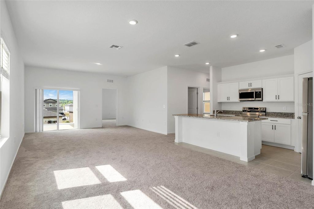 Photo of 1886 Sierra Sun Way, Clermont, FL 34715 (MLS # G5111390)