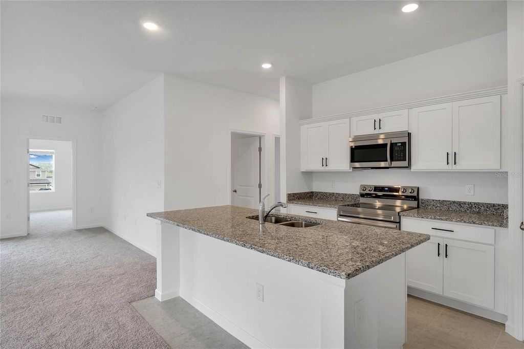 Photo of 1886 Sierra Sun Way, Clermont, FL 34715 (MLS # G5111390)