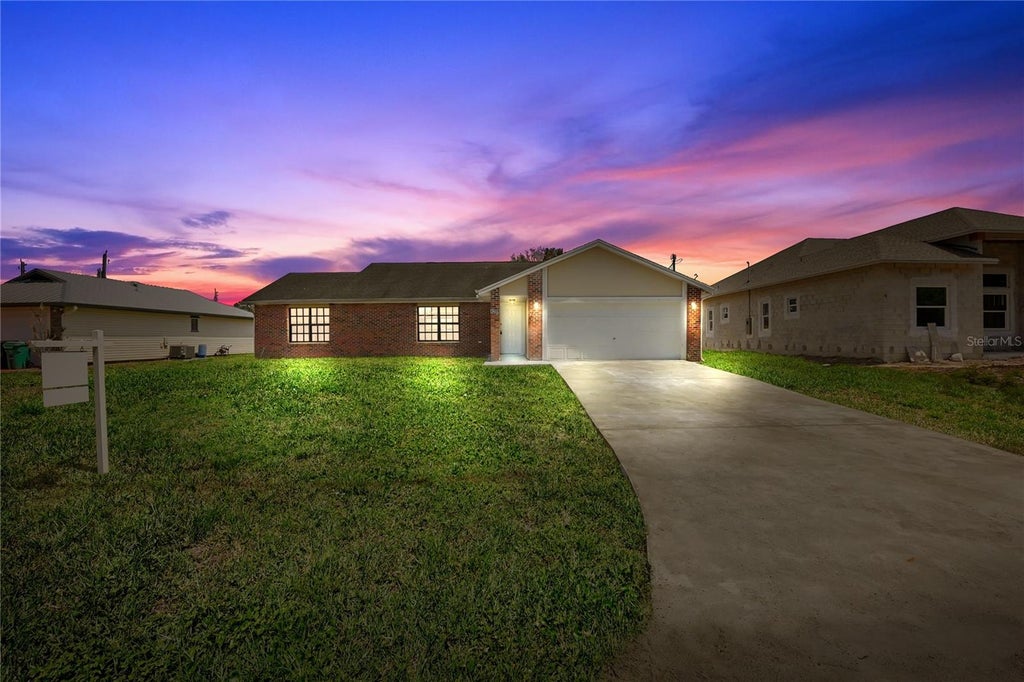 Photo of 4209 SW Tuscol Street, Port Saint Lucie, FL 34953 (MLS # O6431354)
