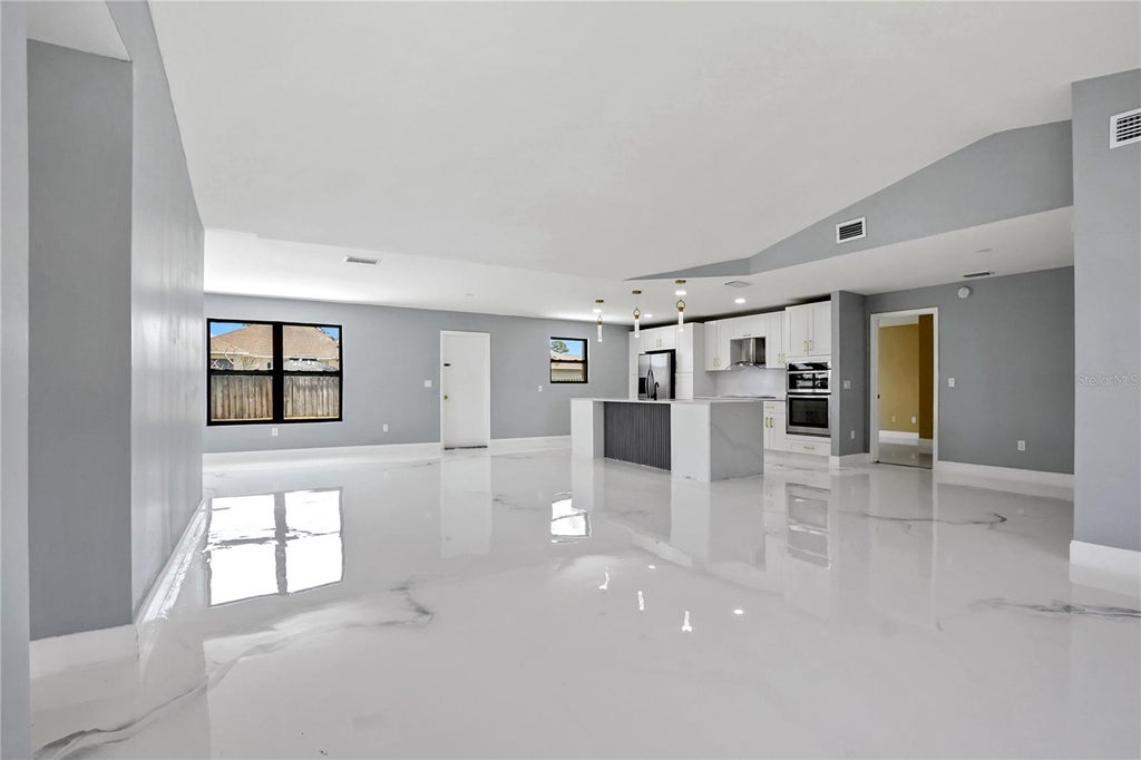 Photo of 4209 SW Tuscol Street, Port Saint Lucie, FL 34953 (MLS # O6431354)