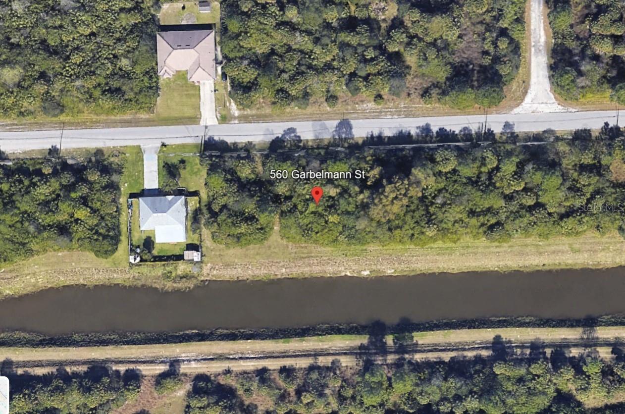 Here’s your chance to create the home you’ve always imagined! This 0.23-acre lot in the growing Port Malabar area offers the freedom to bring your vision to life—no HOA means you can design your house and landscaping exactly how you want it. The property is currently untouched, giving you a blank canvas in a community that’s quickly developing with beautiful new homes.
Palm Bay is known for its relaxed lifestyle and abundance of outdoor activities—whether it’s enjoying the beaches just 30 minutes away, exploring parks and nature trails, or spending the day at world-famous attractions like Walt Disney World, less than two hours away.
Everyday conveniences are close at hand, with a Publix less than 10 minutes away, plus great dining, shopping, golf courses, schools, I-95 access, and Melbourne Orlando International Airport (MLB) nearby.
If you’ve been searching for a well-located lot in a peaceful yet accessible area, this one checks all the boxes. Don’t wait—opportunities like this are hard to find!