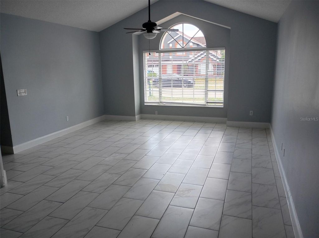 Photo of 5585 Red Bone Lane, Orlando, FL 32810 (MLS # O6403540)
