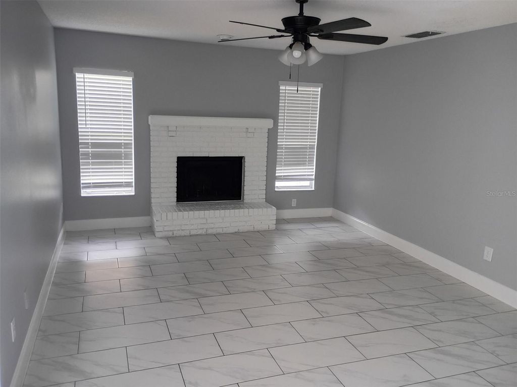 Photo of 5585 Red Bone Lane, Orlando, FL 32810 (MLS # O6403540)