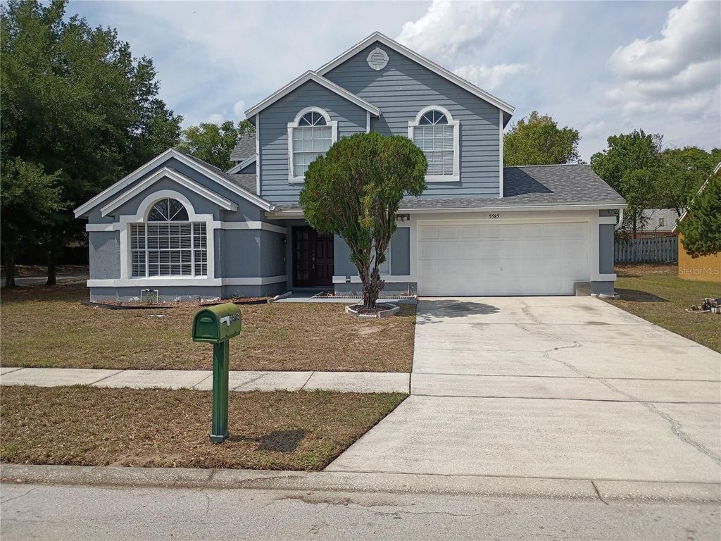 Photo of 5585 Red Bone Lane, Orlando, FL 32810 (MLS # O6403540)