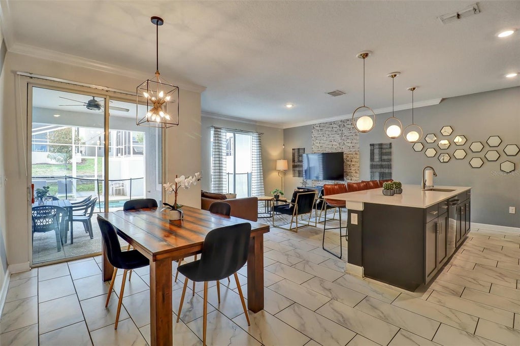 Photo of 1184 Challenge Drive, Davenport, FL 33896 (MLS # O6451146)