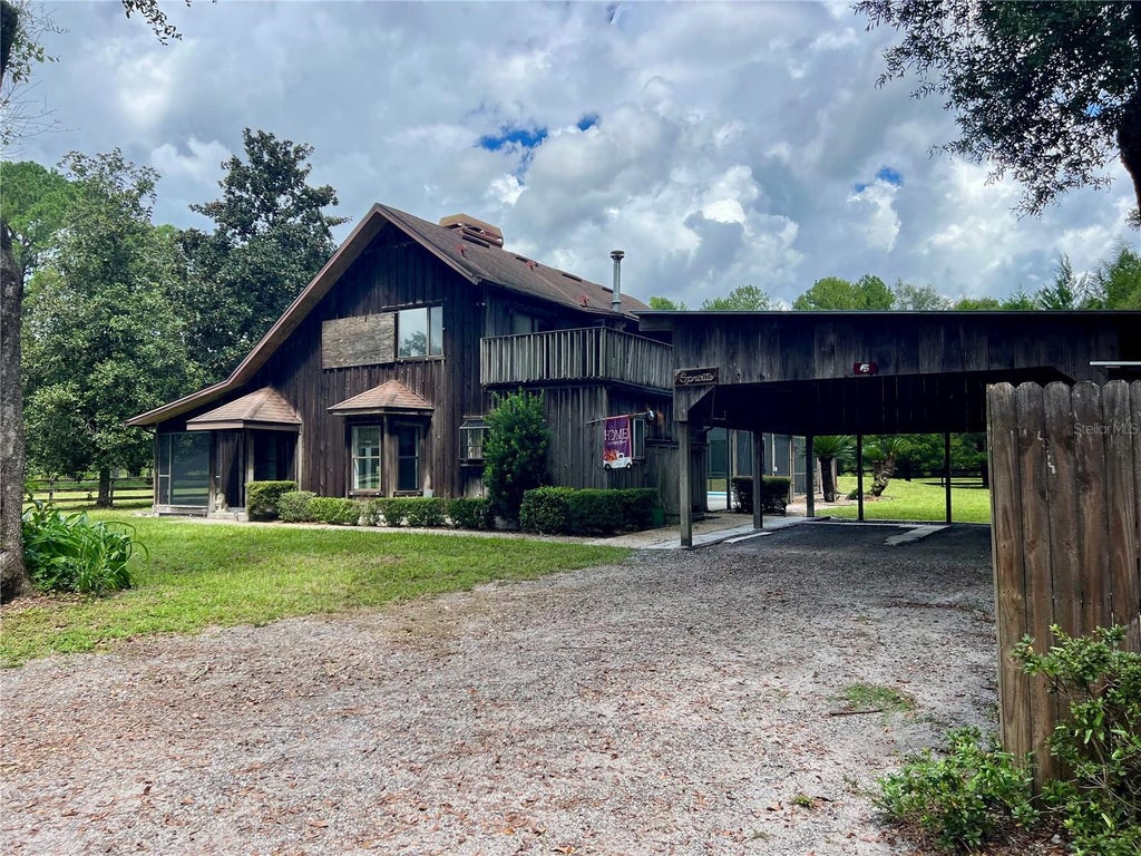 Photo of 15414 SW 63rd Avenue, Archer, FL 32618 (MLS # GC543340)
