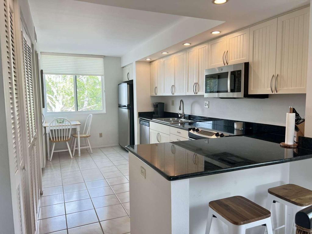 Photo of 843 Bayport Way #843, Longboat Key, FL 34228 (MLS # TB8505224)