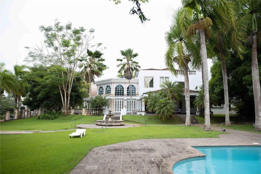 Timeless Luxury in San Patricio Estates: Experience unparalleled elegance in San Patricio Estates, an exclusive gated community with only 50 custom-built residences in the heart of the metro area. Designed by renowned architect Mariano Nevarez and exquisitely decorated by Bunny Williams, this 16,000 sq. ft. estate masterfully blends classic sophistication with contemporary design, creating a timeless and livable home.

This two-story residence features 7 ensuite bedrooms, 10 full bathrooms, 2 powder rooms, and a private guest house, offering an exceptional level of comfort and privacy. The grand interior showcases an open floor plan, soaring ceilings in the living and formal dining areas, abundant natural light, and breathtaking backyard views. Unique Carrara marble floors, a designer kitchen with top-of-the-line Monogram appliances, central A/C, an elegant library, a spacious family room, a maid’s quarter, and a laundry room complete the thoughtfully curated interiors.

Maximizing its expansive outdoor spaces, the estate boasts a lush garden with a gazebo, a resort-style pool, and a separate guest house—ideal for entertaining. A covered carport for five vehicles, along with a full backup generator and water reservoir, ensures the highest standard of living. This remarkable residence is the epitome of luxury, privacy, and sophistication.