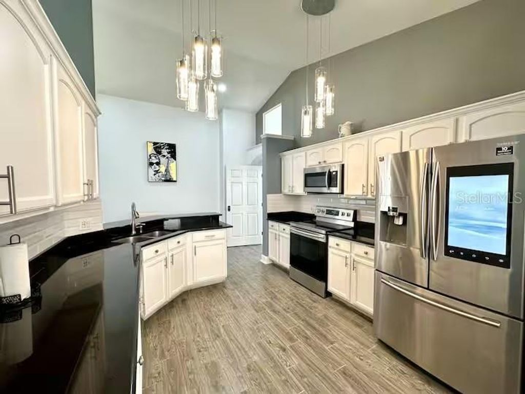 Photo of 1058 Soaring Eagle Lane, Kissimmee, FL 34746 (MLS # S5147516)