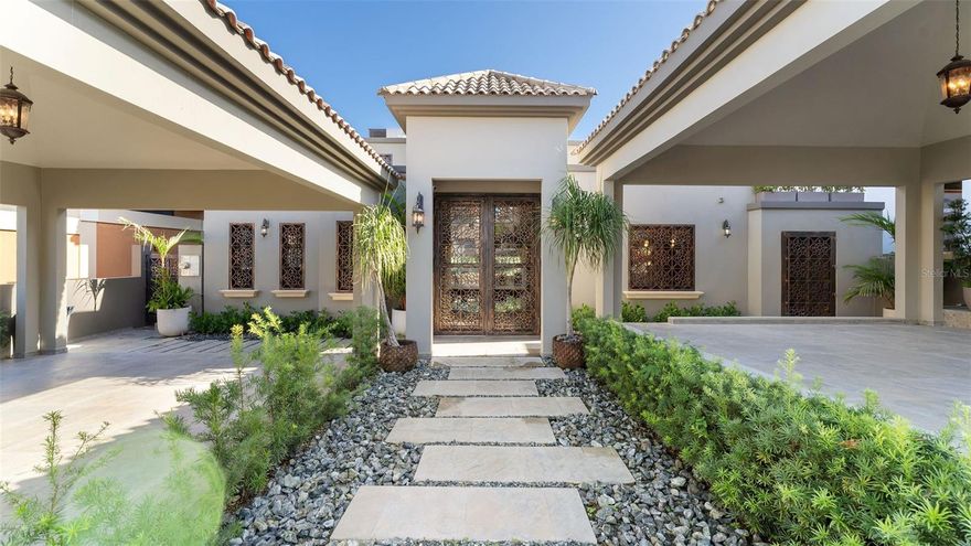 Desirable and luxurious residence in Quintas del Deportivo, Cabo Rojo.
Radiant natural light, a spectacular inside swimming pool, amazing views of the ocean and the golf course are only a few of the many amenities this beautiful estate located within the exclusive grounds of the Club Deportivo del Oeste offers. With over 6,000 sq.ft of interior living space this open floor plan footprint home has been designed to provide the space, features and amenities that any owner desires. If you decide to stay home and relax you can spend time in your amazing indoor swimming pool, go down to the outside jacuzzi that overlooks the golf course, go do some exercise in your personal gym, take some time in your private sauna or have some fun in your game room. Let's say you don't feel like doing much and just want to get confortable and read a book then you can choose between any of your 3 spacious terraces one of them located on your master suite. This custom home includes 3 bedrooms, 3 full baths, two powder rooms in 652 meters of land. Not only  an impressive curb appeal, this home truly offers its owner endless opportunities in lifestyle if you become member of the Club Deportivo because if you decide to step out of the house you can walk right into the 18 hole golf course, enjoy direct beach access, 2 restaurants, tennis courts, volley ball court, comunal gym, swimming pools and a great marina.
Notable features on this dream home include vaulted ceilings on the master suite, expansive kitchen with elegant details and top of the line appliances and formal living room and dining room over looking the golf course. All the bedrooms have walk in closets and private full bathrooms but we do have to mention that the master suite in the second level is something special with your private seating areas, the master bathroom with a huge rainfall shower, copper dip in tub and a nice size walk in closet. All the side wall of the room is glass so you can enjoy the ocean and golf course views but when is time to sleep you can push a bottom and the electronic blackout curtains will set the room for you to sleep at any time day or night. The house is sold with the exclusive furnishings and high quality equipment it possesses like the water softener and filtering system, water reserves and back up generator. The property is located close to some of the best beaches and restaurants in the island and it's the ideal family oasis.