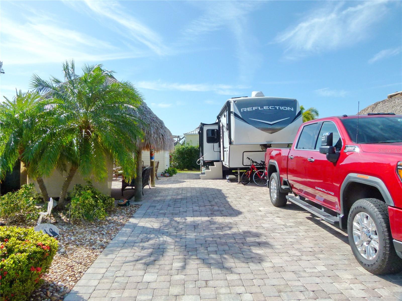 SILVER PALMS 5-STAR RESORT – A Perfect Retreat!
Experience resort-style living with endless activities at Silver Palms 5-Star Resort! This premium lot features elegant pavers, a charming Tiki Hut with comfortable furniture, and a well-equipped Casita complete with a kitchen, bathroom, washer, and dryer for ultimate convenience.
Recent upgrades include a rethatched roof (2022) and an inground sprinkler system to keep the landscape pristine. Located on a quiet street with privacy hedges, this lot offers a serene escape while still being close to all the resort’s top-notch amenities—clubhouse, pool, pickleball, shuffleboard, horseshoes, basketball, and more!
Don’t miss out on this fantastic opportunity to own a piece of paradise!