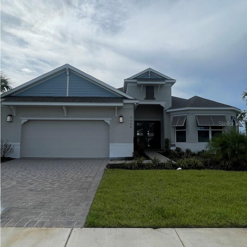Photo of 4364 Curacao Place, Kissimmee, FL 34758 (MLS # O6432402)