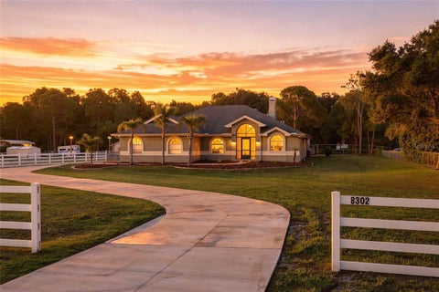 Photo of 8302 West Drive, Wesley Chapel, FL 33544 (MLS # TB8543436)