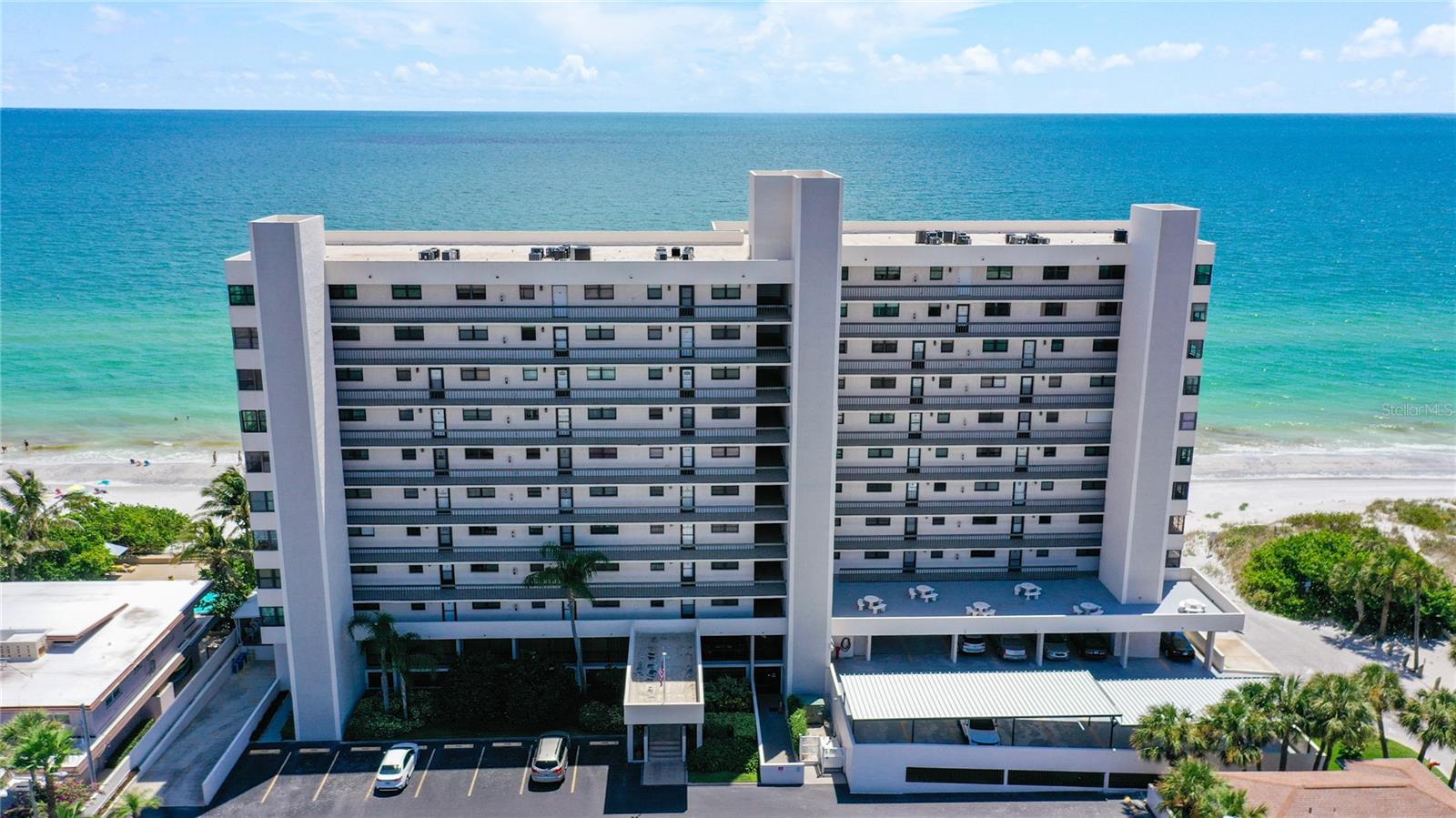 AVAILABLE SEPTBER 15, 2025 for Annual (12 month) or short term (minimum 30 day rental). Annual rate: $3600/month Peak-Season (Jan-April 2026) $7000/month plus tax. Stunning Direct Gulf Front Condo! Enjoy the best of beach living in this newly updated 2 bedroom/2 bath condominium home directly on the beach. Completely renovated kitchen features new custom cabinetry with soft close doors and drawers, granite counters and more. High end Stainless Steel appliances, French door refrigerator, range + combination microwave/convection oven. Newer full size front loading washer & dryer. Wake up to the sounds of the surf in the master bedroom with a king size bed, on-suite bath, step in shower, huge walk in closet with custom built-in storage, and a 50" flat panel television. Brand New Impact Sliding glass doors in both the living room and master bedroom open to the balcony overlooking the beach. The comfortable living room offers plenty of seating and a 60 inch flat panel TV. The guest bedroom has a queen bed, on-suite bath with tub/shower combination and a flat panel television. Beautiful hard wood floors throughout. The balcony is screened and has electric storm shutters. Turnkey furnished. Surfside Towers features assigned under building/garage parking, a secured lobby entry, a heated pool and spa directly on the beach, game room with pool table and ping pong, a newly updated fitness center, BBQ grills and a party/gathering room. Sorry, no pets & no smoking.