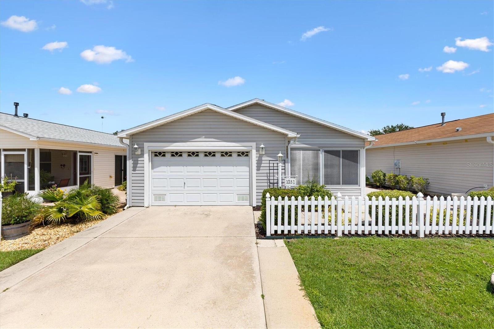 Just minutes from the vibrant Lake Sumter Landing and with NO BOND, this beautifully maintained 2 Bedroom, 2 Bath Patio Villa has a blend of comfort, charm, and convenience for the carefree lifestyle The Villages is known for.
Step inside and you’ll find an inviting, open-concept layout with no carpet and neutral tones that make the home feel fresh and modern. The kitchen features custom-built cabinets and a breakfast bar—ready for morning coffee or casual dining—flowing seamlessly into the living and dining areas, set for both relaxing and entertaining.
The primary suite is a peaceful retreat with a stylish barn-door entry to the en-suite bath and a remodeled tile shower. The versatile second bedroom includes a Murphy bed, making it ready for guests, hobbies, or a home office.
Enjoy your mornings or evenings in the enclosed front lanai, complete with sunshades, where you can unwind with a book or a drink.
Priced to reflect an older roof, allowing you to replace to your own specifications (or purchase subject-to).
This villa has the best of The Villages lifestyle—comfort, convenience, and community—all in one package.