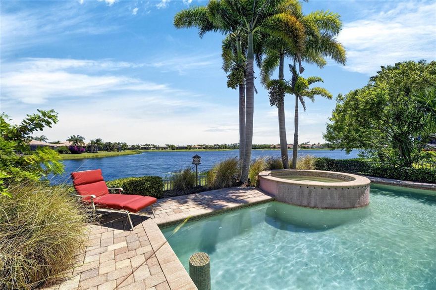 Welcome to Valencia Lakes, a premier 55+ active adult community, where this beautifully furnished Genova model offers the perfect blend of luxury, comfort, and breathtaking lakefront living. This dream home is loaded with fabulous decorator upgrades and exceptional features throughout, including crown molding with trim details, custom paint colors, upgraded tile, wood flooring, designer lighting and ceiling fans, intercom system, gutters, and a stunning custom rear outdoor living space complete with a pool, spa, and expansive pool deck overlooking the large lake.
The gourmet kitchen is sure to impress with rich wood cabinetry featuring decorative detailing, granite countertops, and stainless steel appliances, making it as functional as it is beautiful. The spacious primary suite offers a relaxing retreat, while the luxurious primary bath showcases wood cabinetry, granite countertops, custom tile work, and elegant designer finishes, including crown molding within the coffered ceiling.
Step outside and take in the spectacular lake view while enjoying your own private backyard oasis. Beyond the home, Valencia Lakes offers an unmatched resort-style lifestyle. The fabulous waterfront outdoor recreation area features a heated resort-style pool, lap pool, resistance pool, Har-Tru tennis courts, half-court basketball, softball field, pickleball courts, racquetball, horseshoes, shuffleboard, and bocce.
Inside the impressive clubhouse, residents enjoy a large social hall, aerobics studio, fitness center, steam rooms, saunas, library, billiards room, card rooms, and more. Unwind at the Internet café and experience the very best of active adult living in paradise or enjoy lunch poolside at Mattison's Restaurant.
Move into Valencia Lakes and let life begin at home.