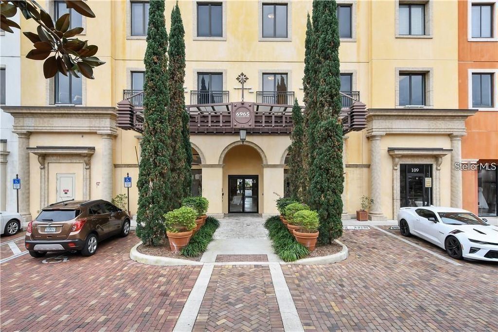 Photo of 6965 Piazza Grande Avenue #209, Orlando, FL 32835 (MLS # O6383404)