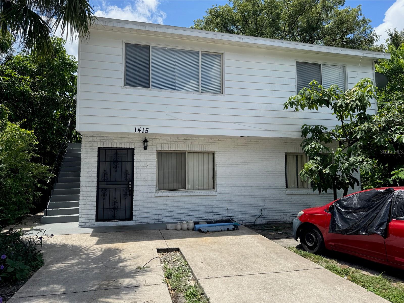 Discover a smart investment opportunity with this income-producing duplex at 1415 E Holland Ave in Tampa. This two-story property has just been refreshed and features one fully remodeled unit—perfect for attracting premium tenants or occupying as an owner while collecting rent from the other.
The other unit is currently occupied by a month-to-month tenant, offering built-in cash flow with flexibility for future use or upgrades. Utilities are investor-friendly with separate electric meters and a shared water meter. The owner currently covers water and garbage removal, simplifying management for a new buyer.
Located in a growing area of Tampa with strong rental demand, this duplex is ideal for both seasoned investors and house hackers looking to live in one unit and rent the other. Whether you're expanding your portfolio or jumping into multifamily ownership, this is a property that works from day one.