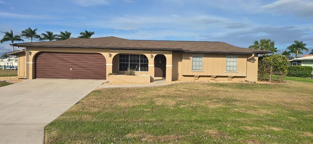 Photo of 110 Sinclair Street SE, Port Charlotte, FL 33952 (MLS # C7524611)