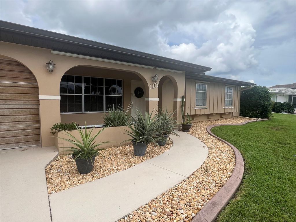 Photo of 110 Sinclair Street SE, Port Charlotte, FL 33952 (MLS # C7524611)