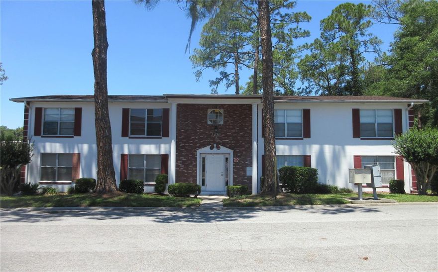 1st Floor Condo at end of street.  Ceramic tile throughout, Stackable washer/dryer unit.  Enjoy your morning coffee on your own enclosed Florida Room. Includes water, sewer, trash, community pool.