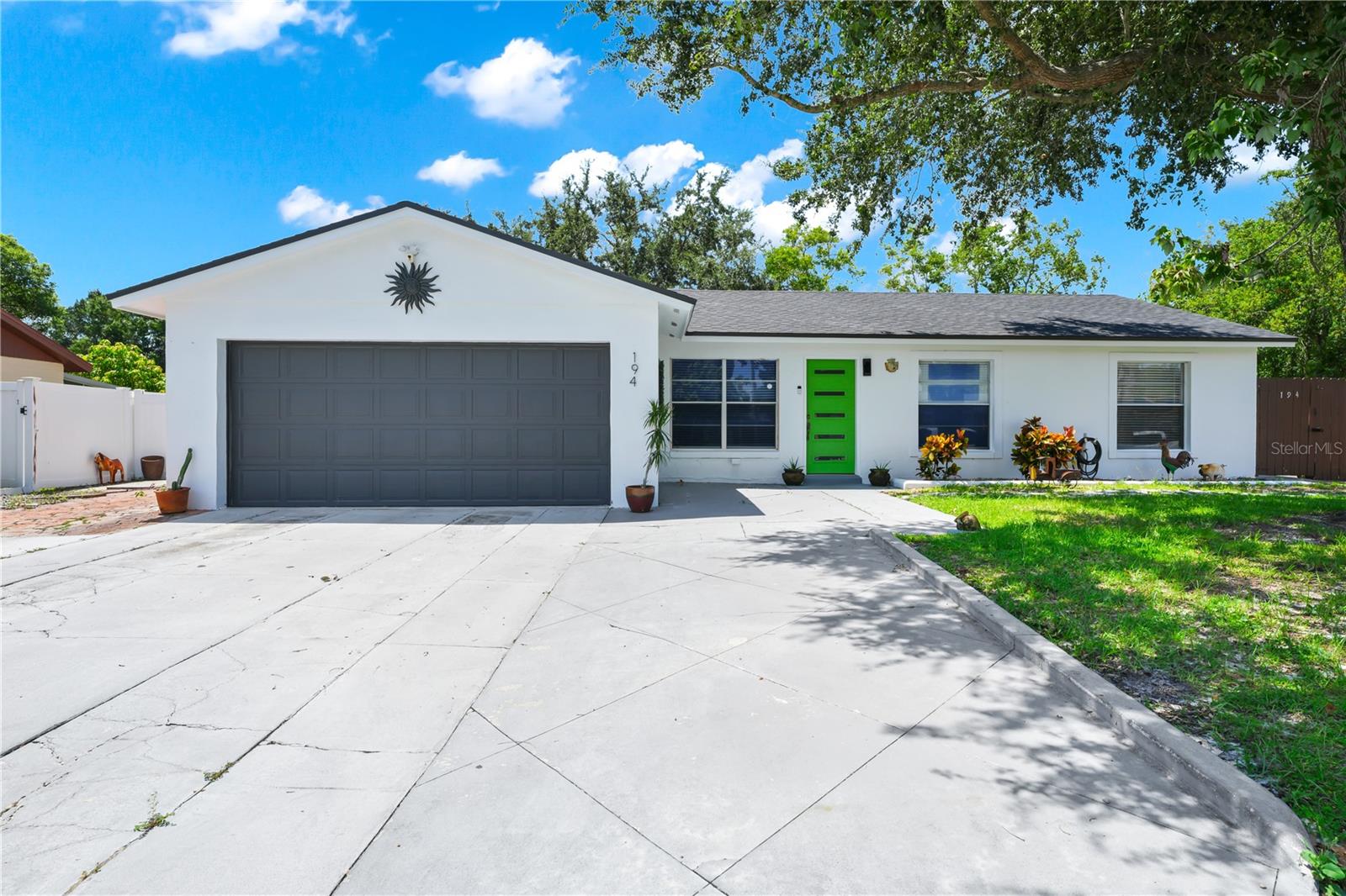 Beautifully updated 4-bedroom, 2-bath home nestled on a quiet cul-de-sac in the heart of Kissimmee! This spacious residence features nearly 1,900 sq ft of living space, highlighted by a bright Florida room, a versatile den/office, and cathedral ceilings that enhance the open feel. Enjoy peace of mind with a newer roof, A/C, and water heater (all 2022), plus a freshly painted exterior (2024). The kitchen and bathrooms have been tastefully remodeled with granite countertops and modern finishes, while the oversized driveway adds convenience and curb appeal. Perfectly located near shopping, dining, major highways, and attractions. No HOA! Move-in ready and priced to sell—schedule your private tour today!