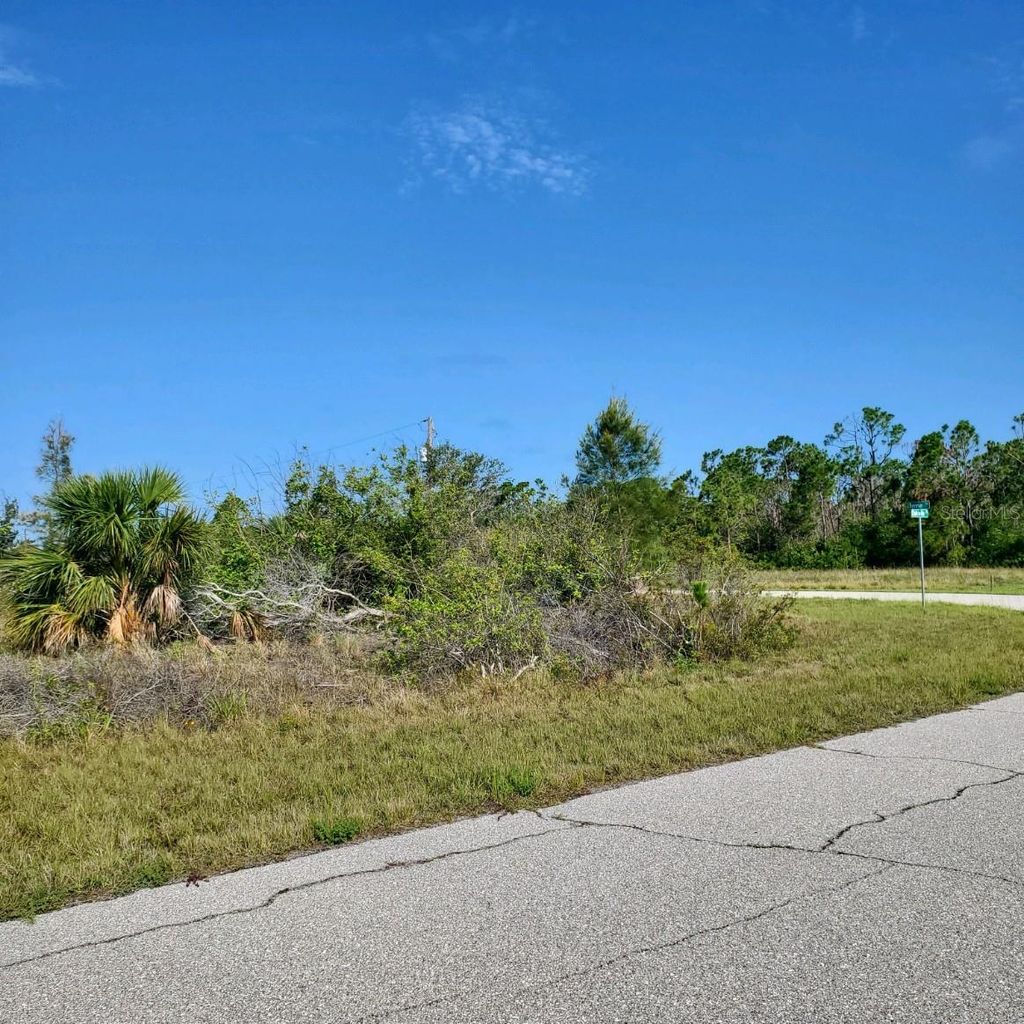 Photo of 16285 Rennie Road, Port Charlotte, FL 33981 (MLS # T3466620)