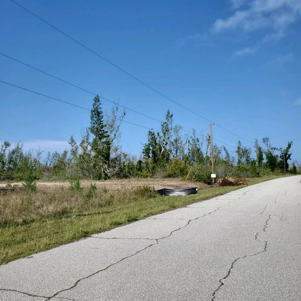 Photo of 16285 Rennie Road, Port Charlotte, FL 33981 (MLS # T3466620)