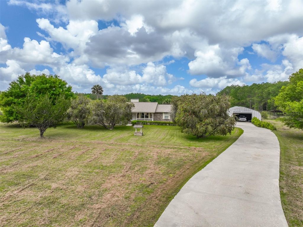 Photo of 235 Quarter Horse Lane, Bunnell, FL 32110 (MLS # FC317487)