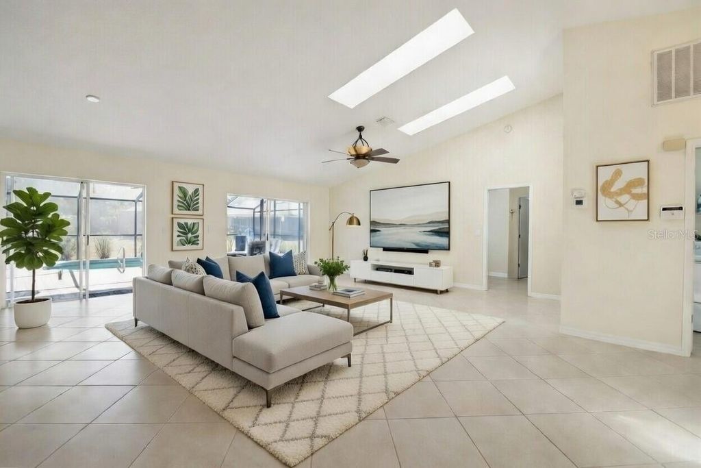 Photo of 7135 Queen Palm Circle, Sarasota, FL 34243 (MLS # A4684074)