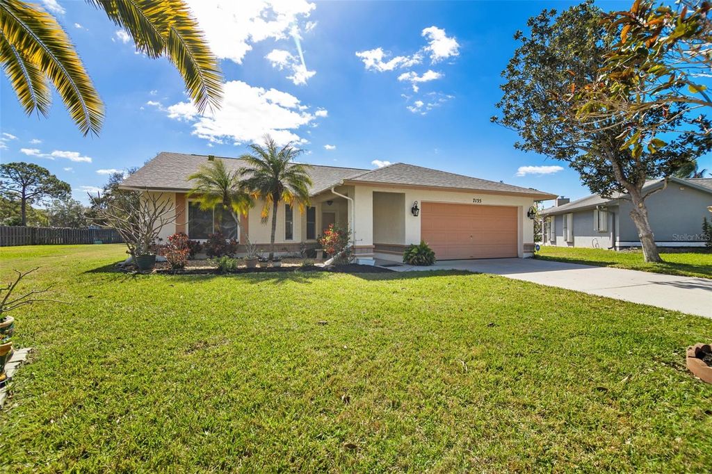 Photo of 7135 Queen Palm Circle, Sarasota, FL 34243 (MLS # A4684074)