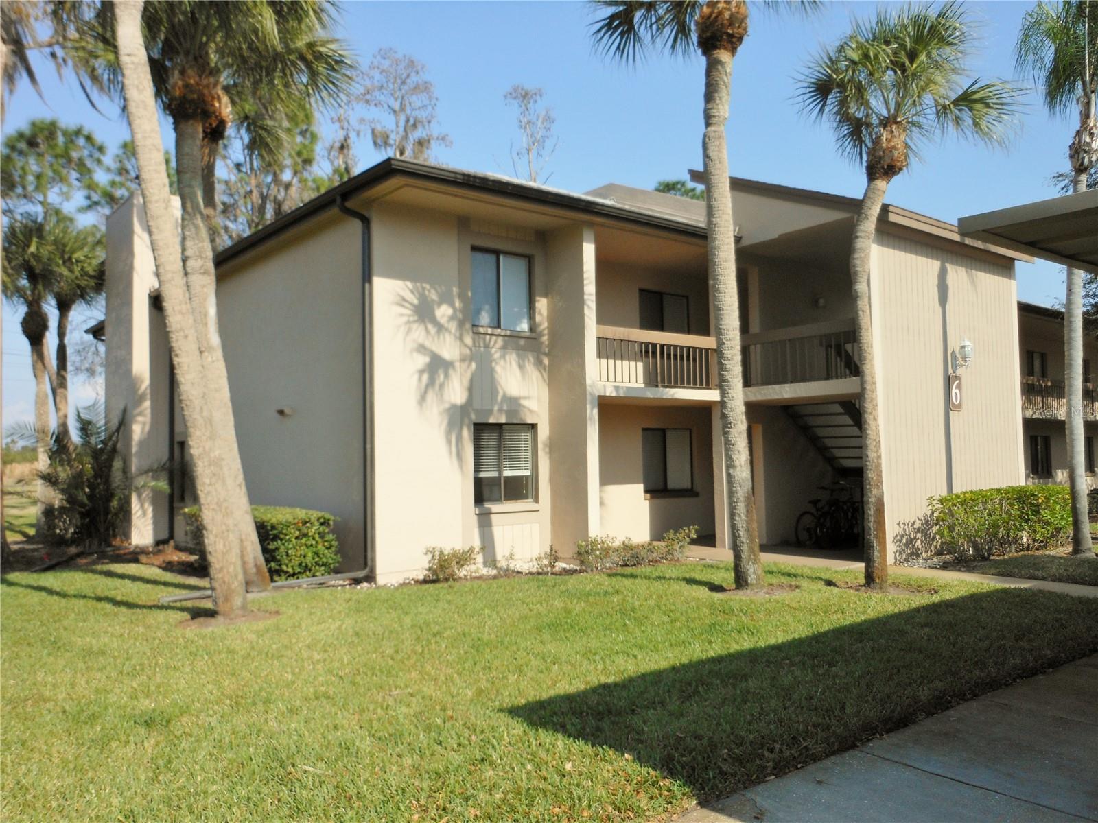 OWNER WILL RENT UNFURNISHED UPON REQUEST. Beautifully furnished second floor end unit condo in gated East Lake Woodlands! Spacious eat-in tiled kitchen with plenty of counter space, closet pantry, window at the kitchen table and breakfast bar to the living and dining area. Living area with wood laminate flooring, wood burning fireplace and sliders out to the screen enclosed lanai overlooking peaceful view of the preserve and landscaping. Split bedroom plan with guest bedroom having lots of closet space and built in shelving along one wall, guest bath with tub. Master bedroom has king size bed, tv, two walk in closets, linen closet, separate dressing area with vanity and shower only in the master bath. Washer and dryer is located in the utility closet on the enclosed lanai. Covered parking and community pool nearby. Water, sewer, trash and basic cable is included in the rent. This is a non smoking residence please and no pets.
All Century21 Integra residents are enrolled in the Resident Benefits Package (RBP) for $50.00/month which includes liability insurance, credit building to help boost the resident’s credit score with timely rent payments, up to $1M Identity Theft Protection, HVAC air filter delivery (for applicable properties), move-in concierge service making utility connection and home service setup a breeze during your move-in, our best-in-class resident rewards program, and much more! More details upon application.