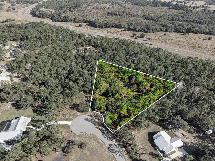 Discover the perfect opportunity to build your dream home on this 1.13-acre vacant homesite! Tucked away at the end of a quiet cul-de-sac, this property offers peace, privacy, and space while still being in a highly sought-after neighborhood known for its charm and convenience. With a minimal HOA and plenty of room for custom designs, outbuildings, or etc, this lot provides flexibility rarely found today.

Conveniently located just minutes from The Villages, shopping, dining, golf, and everyday essentials. You’re also just a quick drive to I-75 and the Florida Turnpike, giving you easy access to both Orlando and Tampa—each roughly an hour away.

Don’t miss your chance to own acreage in one of Wildwood’s most desirable locations!