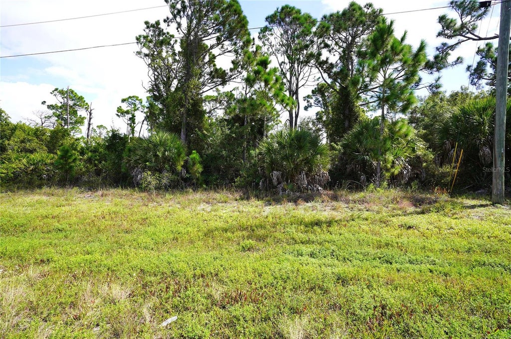 Photo of 12443 Gulfstream Boulevard, Port Charlotte, FL 33981 (MLS # C7532746)