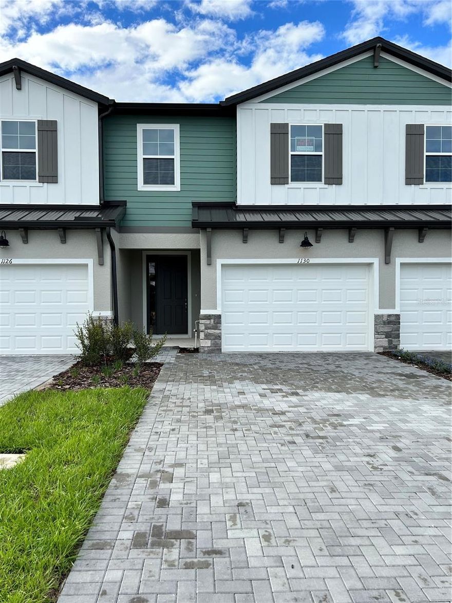 Welcome to your brand new home in the desirable Magnolia Reserve community of Ocoee.  This stunning 2025 built townhome combines modern comfort and elegant finishes. As you step inside to an open-concept main floor, featuring bright natural light and a spacious living and dining area.  Upstairs you'll find a versatile loft area, ideal for a cozy media space.  Located just minutes away from SR 429, shopping, dining and top-rated schools.  Don't miss this opportunity!