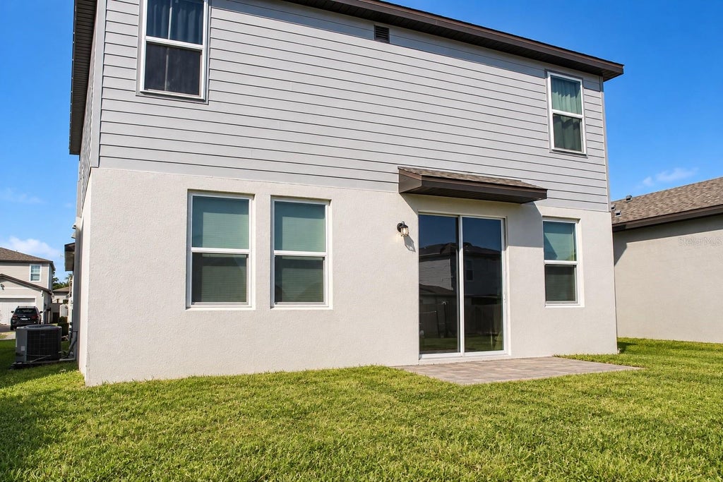 Photo of 3511 Monaco Lane, Davenport, FL 33897 (MLS # O6452730)