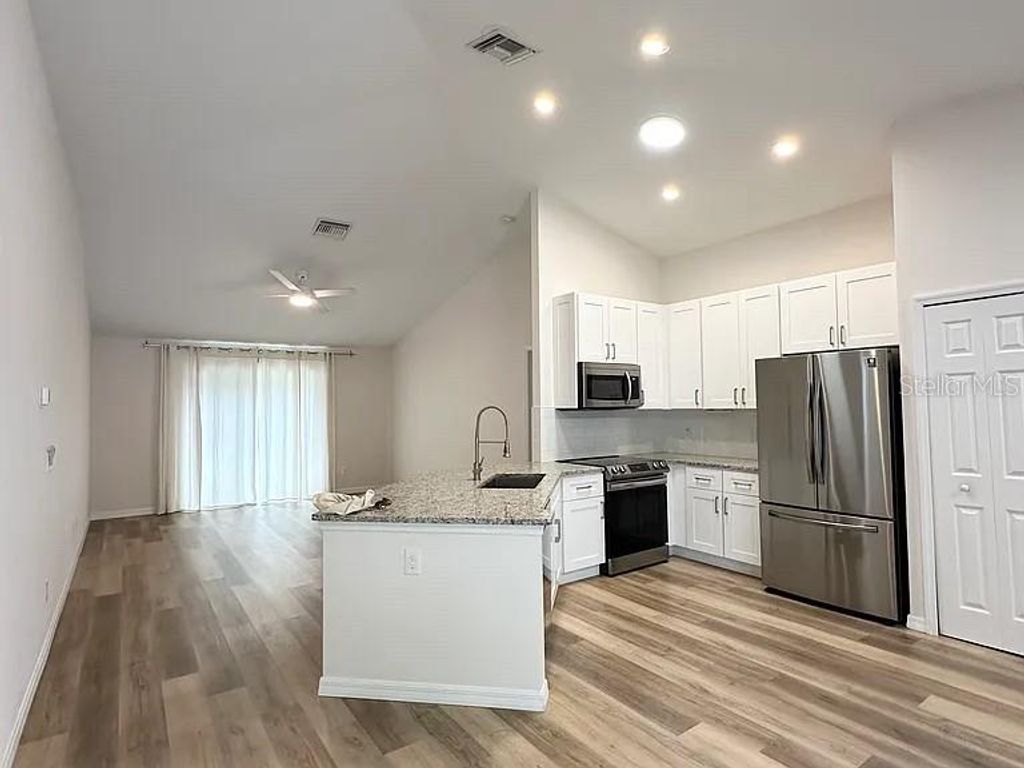 Photo of 1737 N Lakewood Avenue, Ocoee, FL 34761 (MLS # TB8401637)