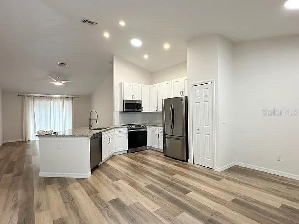 Photo of 1737 N Lakewood Avenue, Ocoee, FL 34761 (MLS # TB8401637)